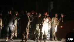 敘利亞反抗軍閃電襲擊該國第二大城阿勒頗，並佔領部份市區。 (法新社：2024年11月30日)