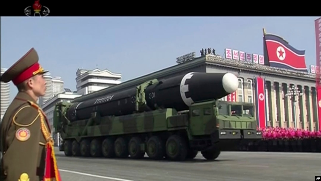 In this image made from video by North Korea's KRT, a military parade is held in Pyongyang, North Korea, Feb. 8, 2018. North Korea's intercontinental ballistic missiles highlighted the event.