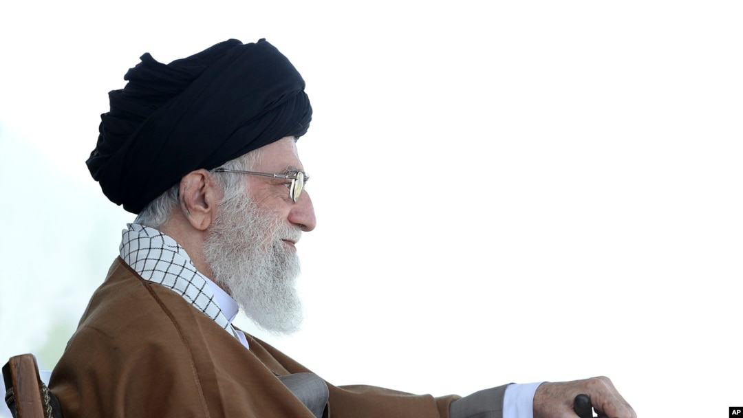 In this picture released by official website of the office of the Iranian supreme leader, May 10, 2017, Supreme Leader Ayatollah Ali Khamenei attends a graduation ceremony for Revolutionary Guard cadets in Tehran. Iran's supreme leader warned that anyone trying to foment unrest around the upcoming presidential election "will definitely be slapped in the face." 