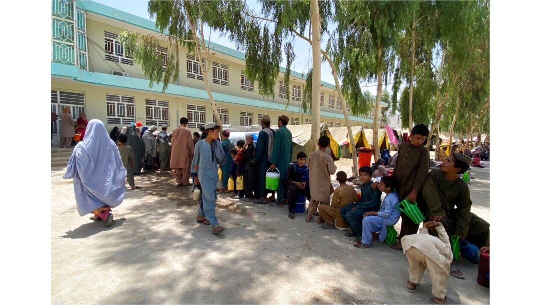 Internally displaced Afghans who fled their home due to fighting between the Taliban and Afghan security personnel, are seen at a camp in Daman district of Kandahar province south of Kabul, Afghanistan, Aug. 5, 2021.