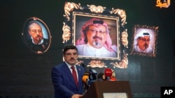 Yasin Aktay, an advisor to Turkey's President Recep Tayyip Erdogan, speaks during an event organized to mark the 40th day of the death of Saudi writer Jamal Khashoggi, in Istanbul, Nov. 11, 2018.