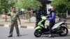 Indonesian City Bars Women from Working Late at Night