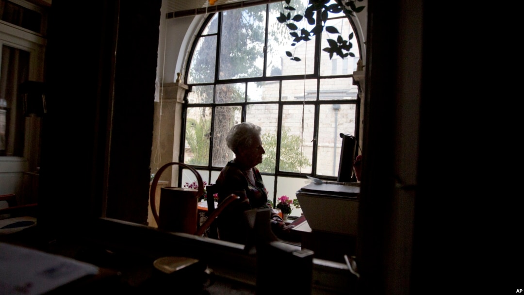 FILE - In this Jan. 20, 2016, photo, Dutch Israeli holocaust survivor Mirjam Bolle is seen in her house in Jerusalem. Throughout the Nazi occupation of Amsterdam, and while incarcerated in two prison camps, Bolle wrote letters to her fiance that she never