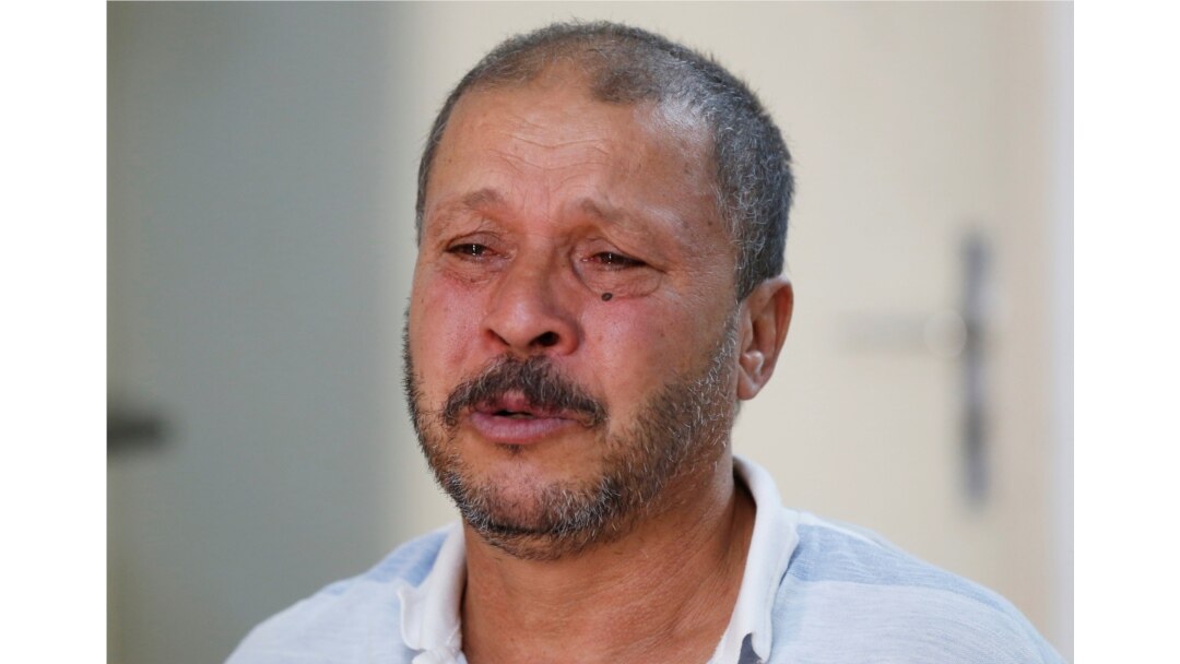 Mokhtar Hmidi, Fakher's father, reacts during an interview with Reuters in Thina district of Sfax, Tunisia, Oct. 15, 2019.