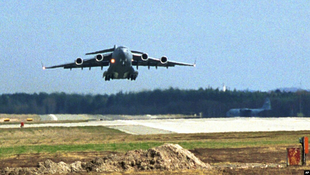 FILE - A US Air Force C17 Globemaster 3 transport plane takes off from Ramstein airbase, with humanitarian aid.