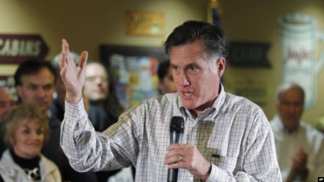 Republican presidential candidate, former Massachusetts Gov. Mitt Romney speaks during a town hall meeting, in Sioux City, Iowa, December 31, 2011.