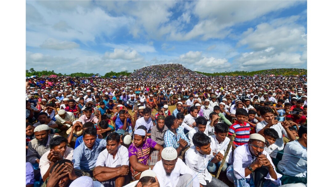 FILE - Rohingya refugees attend a ceremony to mark the second anniversary of the exodus at the Kutupalong refugee camp in Ukhia, August 25, 2019.