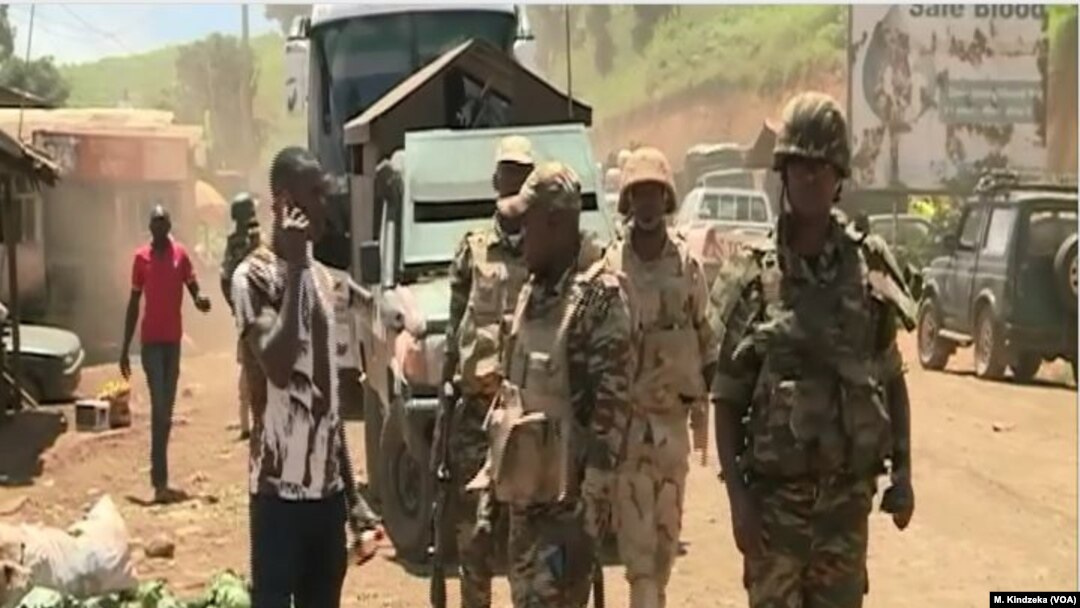 FILE - Cameroon troops watch for separatists in Cameroon's northwest region, Bamenda, Cameroon, May 24, 2019. 