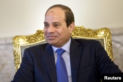 Egypt's President Abdel Fattah al-Sisi sits before a meeting at the presidential palace in Cairo Aug. 2, 2015.