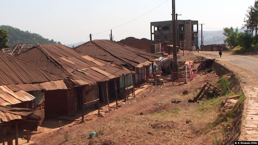 Clothes hang on a clothes line in front of a row of largely abandoned homes, in Kumbo, Cameroon, Jan. 3, 2019.