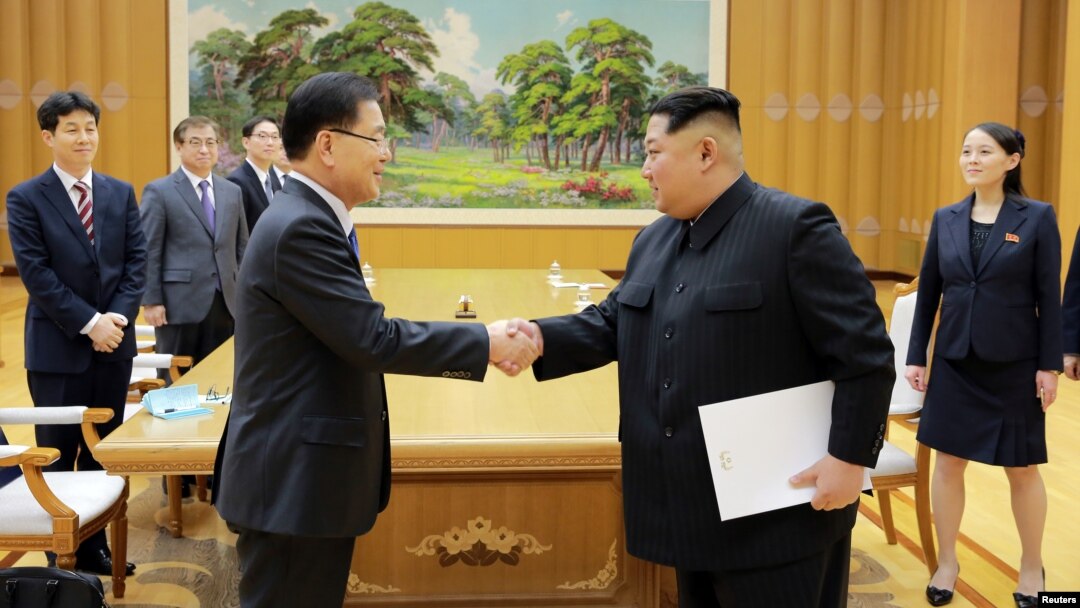 North Korean leader Kim Jong Un greets Chung Eui-yong, head of the presidential National Security Office, in Pyongyang, North Korea, March 6, 2018. 
