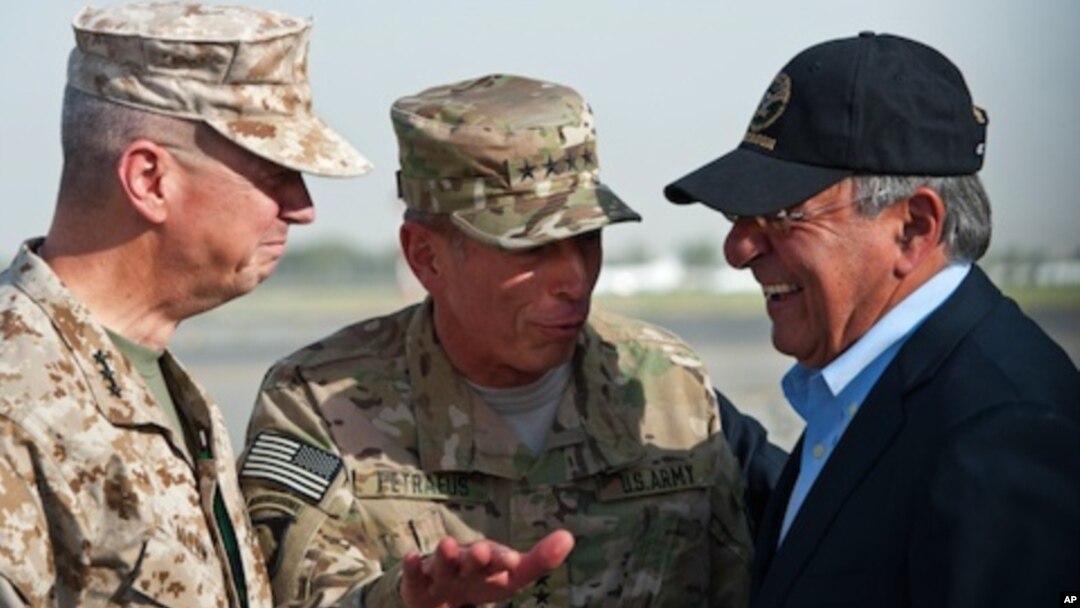 USMC Gen. John Allen, left, and Gen. David Petraeus, incoming CIA Director, greets former CIA Director and new U.S. Defense Secretary Leon Panetta as he lands in Kabul, Afghanistan, Saturday, July 9, 2011.