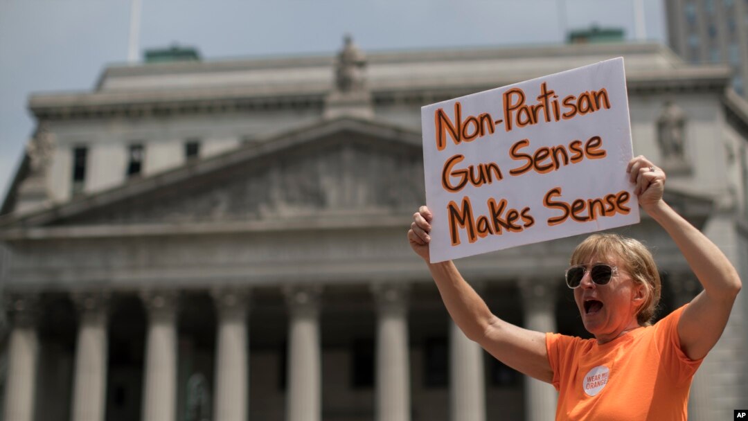 A demonstrator chant slogans during a march and rally against gun violence, Saturday, June 2, 2018, in New York. (AP Photo/Mary Altaffer)