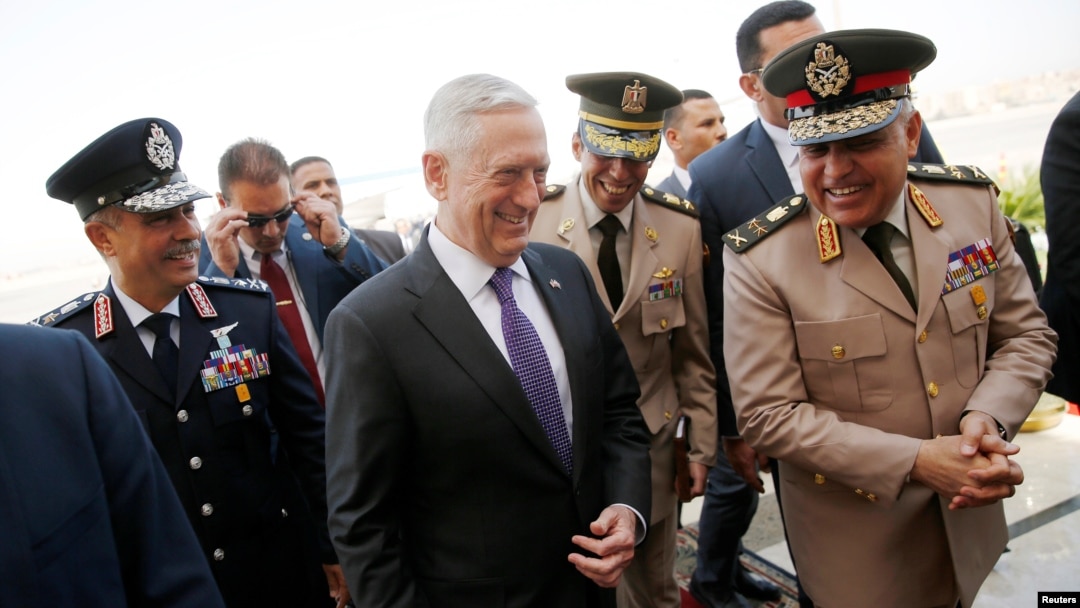 Egypt's Minister of Defense Sedki Sobhi (R) greets U.S. Defense Secretary Jim Mattis (C) upon his arrival at Cairo International Airport in Cairo, Egypt, April 20, 2017.