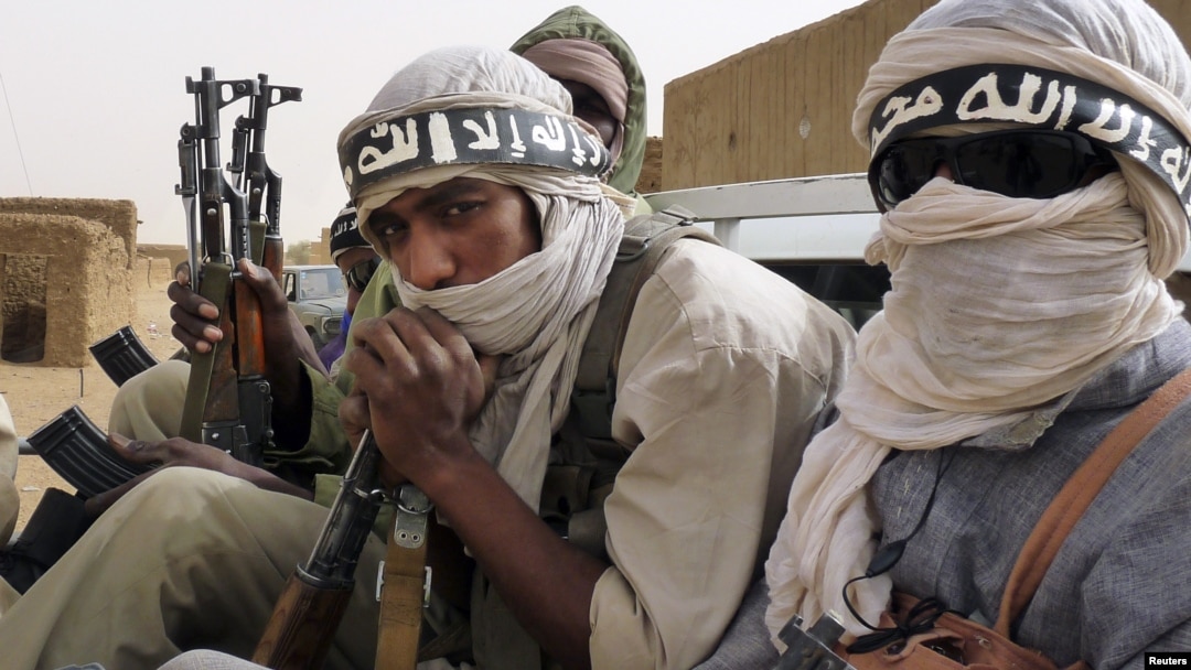 Ansar Dine militiamen traveling in Kidal, northeastern Mali, June 16, 2012.