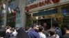 Iran's Currency Hits Record Low; Police Target Illicit Trading 