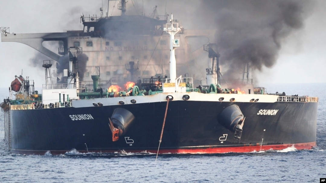 This undated photo released by the private security firm Ambrey shows the oil tanker Sounion burning in the Red Sea. 