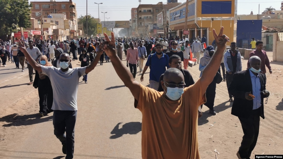 Sudanese protesters rallying against the military take to the streets of Khartoum, Jan. 6, 2022. Protests followed the resignation of civilian Prime Minister Abdalla Hamdok this week, which left the military fully in charge.