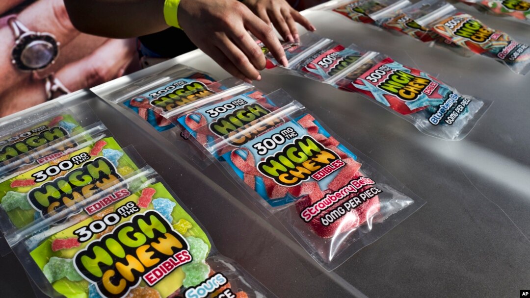 FILE - In this Saturday, Oct. 20, 2018 photo medicated High Chew edibles are shown on display and offered for sale at the cannabis-themed Kushstock Festival at Adelanto, Calif. (AP Photo/Richard Vogel)