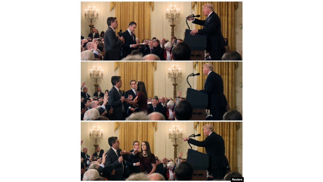 A White House staff member reaches for the microphone held by CNN's Jim Acosta during a Nov. 7, 2018 news conference, in a combination of photos at the White House.