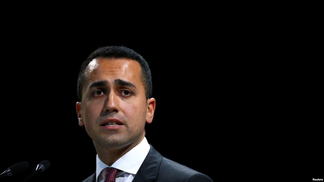 FILE - Italian Minister of Labor and Industry Luigi Di Maio speaks at the Italian Business Association Confcommercio meeting in Rome, June 7, 2018.