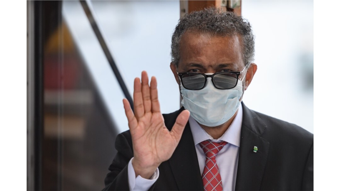 World Health Organization (WHO) Director-General Tedros Adhanom Ghebreyesus wears a protective face mask after leaving a ceremony for the restarting of Geneva's landmark fountain, following the COVID-19 outbreak, in Geneva, June 11, 2020.