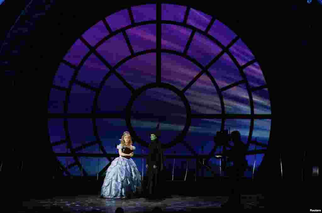 Actors Jennie Barber (left) and Christine Dwyer perform a scene from "Wicked" onstage during the American Theatre Wing's 68th annual Tony Awards at Radio City Music Hall in New York, June 8, 2014.