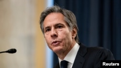 拜登的國務卿人選布林肯(Anthony Blinken)2021年1月19日在參議院外委會接受質詢（路透社轉發媒體聯訪照片）