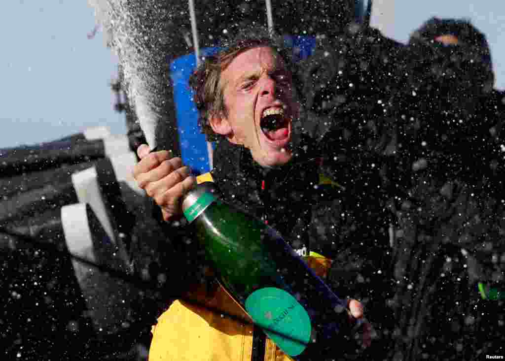 Macif Sante Prevoyance's Charlie Dalin celebrates after winning the Vendee Globe sailing competition in Les Sables-d'Olonne, France.