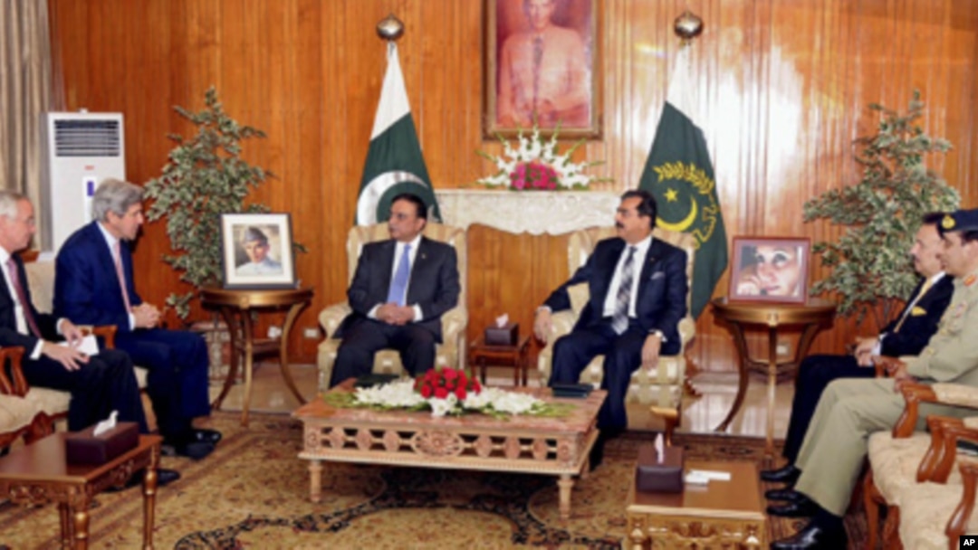 Photo released by Pakistan Press Information department shows Pakistan's President Asif Ali Zardari, (3rd L) and U. S. Senator John Kerry (2nd L) in Islamabad, Pakistan, May 16, 2011