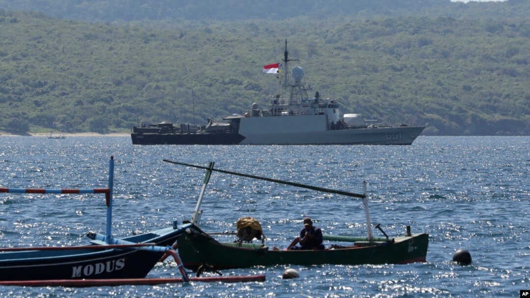 Indonesian Navy ship KRI Singa sails to take part in the search for submarine KRI Nanggala that went missing while participating in a training exercise on Wednesday, off Banyuwangi, East Java, Indonesia, Thursday, April 22, 2021. (AP Photo)