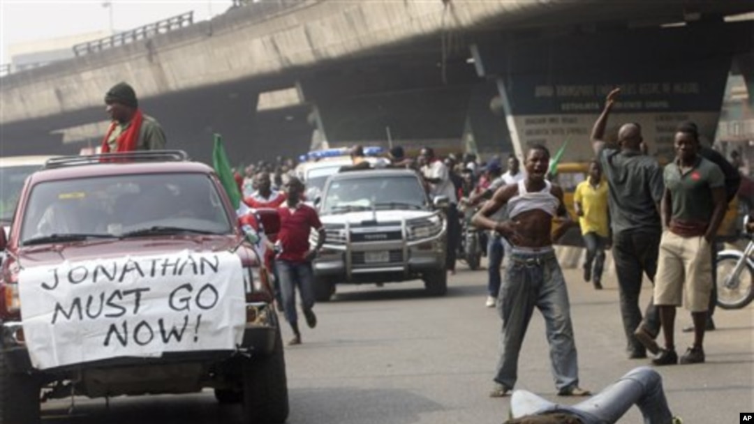 Angry youths protest on the streets following the removal of a fuel subsidy by the government, in Lagos, Nigeria, Thursday, Jan. 12, 2012. A union representing 20,000 oil and gas workers in Nigeria threatened Thursday it would shut down all production st
