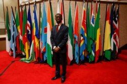 President of the Pan African Parliament Cameroonian Roger Nkodo Dang poses inside the house following its postponement following chaotic and violent scenes that played out during the leadership rotation elections.