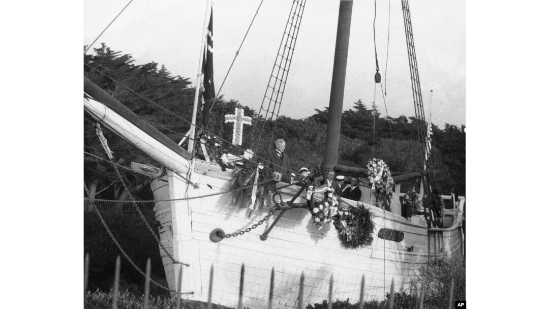FILE - In this Dec. 14, 1928 file photo, O.T. Brandrud, Pastor of the Trinity Lutheran Church of Oakland, speaks during memorial services for explorer Roald Amundsen at the land anchorage of his former ship, the Gjoa, in Golden Gate Park, San Francisco. Amundsen sailed the Gjoa through the Northwest Passage in 1903, a voyage that took three years to accomplish.