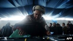 Afghan man casts vote at local polling station, Kabul, April 5, 2014.