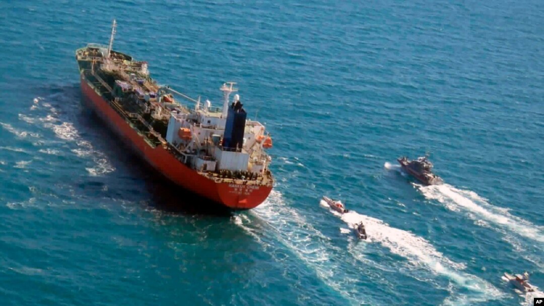FILE - In this Jan. 4, 2021, photo released by Tasnim News Agency, the South Korean-flagged tanker MT Hankuk Chemi is escorted by Iranian Revolutionary Guard boats on the Persian Gulf.