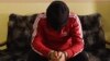 Visibly shaken, a confessed IS militant claimed he wanted to leave the group when he saw violent acts like chopping off hands and beheadings, but he would have been executed if he ran, in Kirkuk, Iraq on Feb. 9, 2014. (Photo: H. Ibrahim Shekha for VOA)