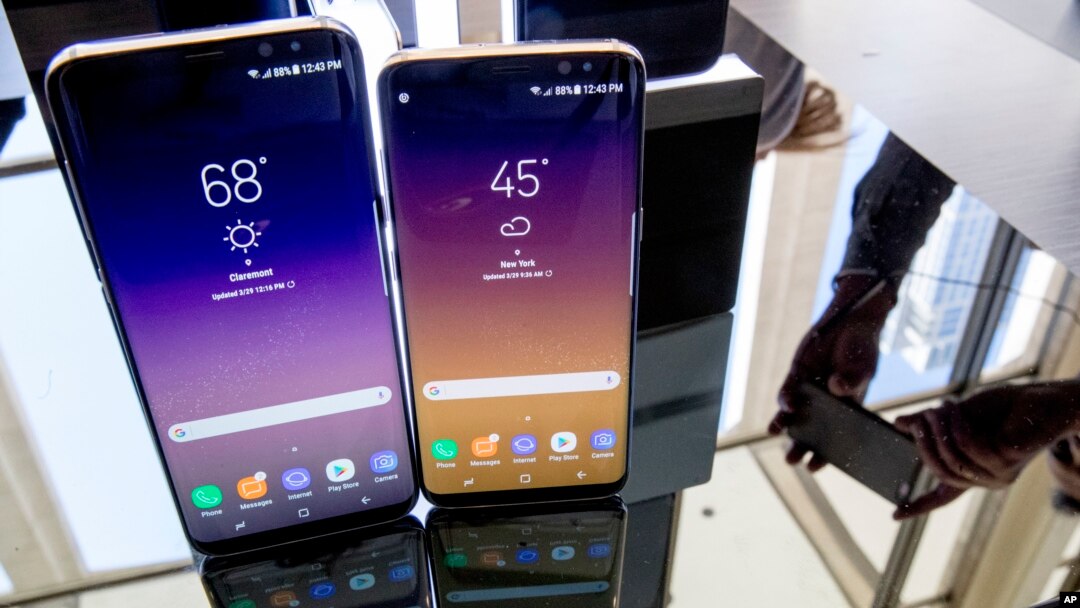 The Samsung Galaxy S8, right, and S8 Plus appear on display after a news conference, Wednesday, March 29, 2017, in New York. The Galaxy S8 features a larger display than its predecessor, the Galaxy S7.