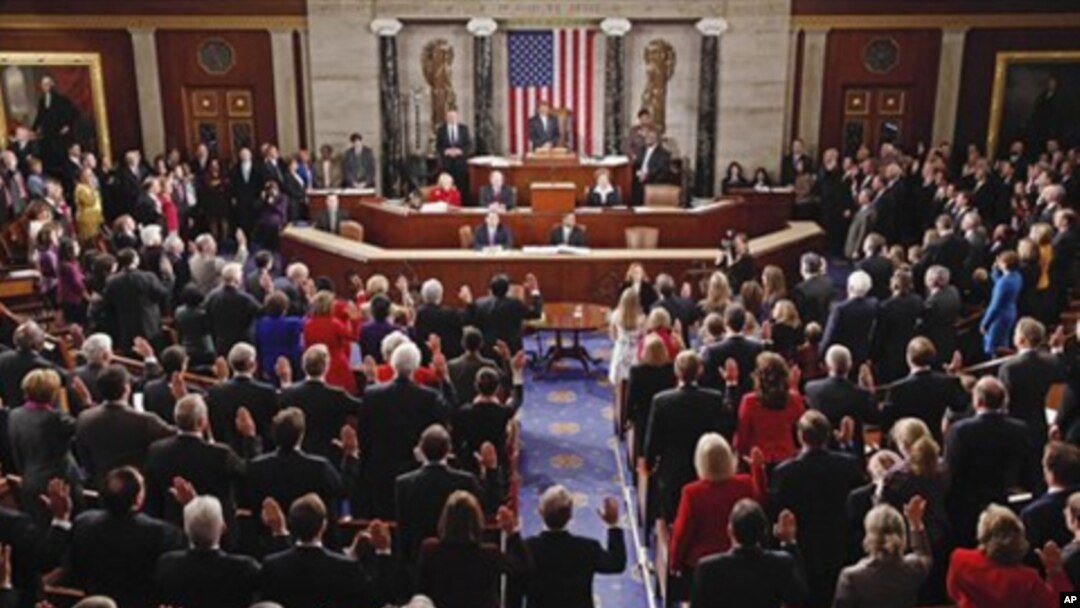 House members take their oath of office during the first session of the 112th Congress, on Capitol Hill in Washington, Wednesday, Jan. 5, 2011. (AP Photo/Charles Dharapak)