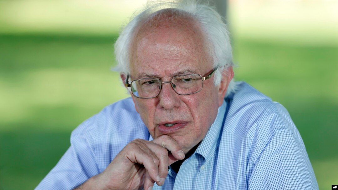 FILE - Democratic presidential candidate, Sen. Bernie Sanders, I-Vt., speaks during a television interview before a town hall meeting, Sept. 3, 2015, in Grinnell, Iowa.