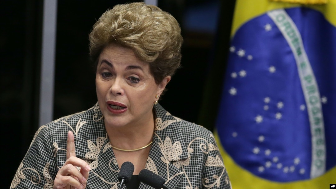 FILE - Brazil Political Crisis: Brazil's suspended President Dilma Rousseff speaks at her own impeachment trial, in Brasilia, Brazil, Monday, Aug. 29, 2016. 