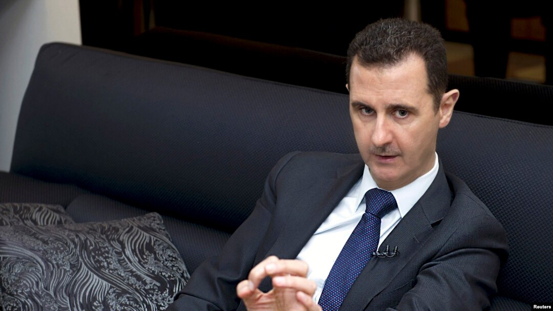 Syria's President Bashar al-Assad speaks during an interview with a German newspaper in Damascus, in this handout photograph distributed by Syria's national news agency SANA, Jun. 17, 2013.