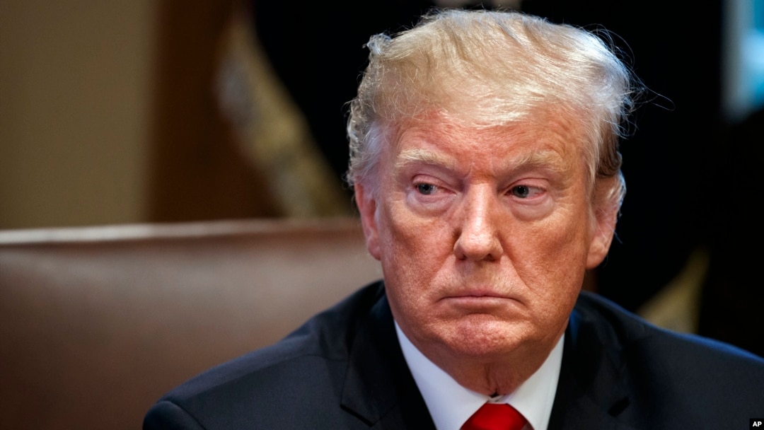 President Donald Trump listens during a cabinet meeting at the White House, Jan. 2, 2019, in Washington.