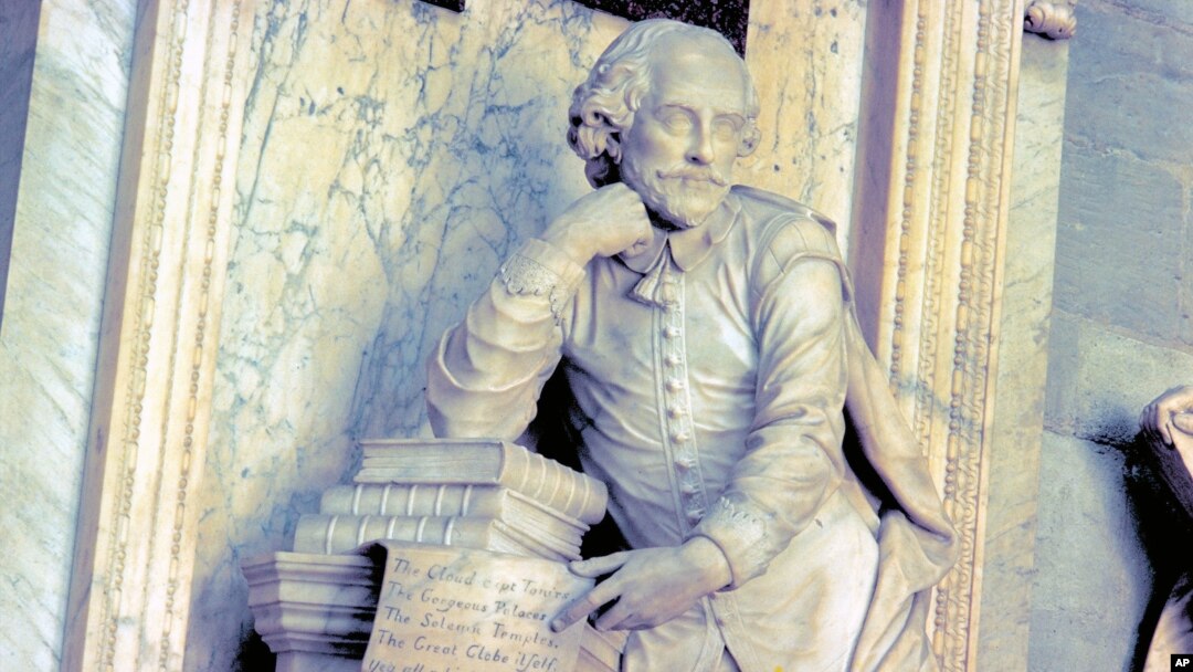 FILE - Photo provided by VisitBritain shows a monument to William Shakespeare at Westminster Abbey in London.