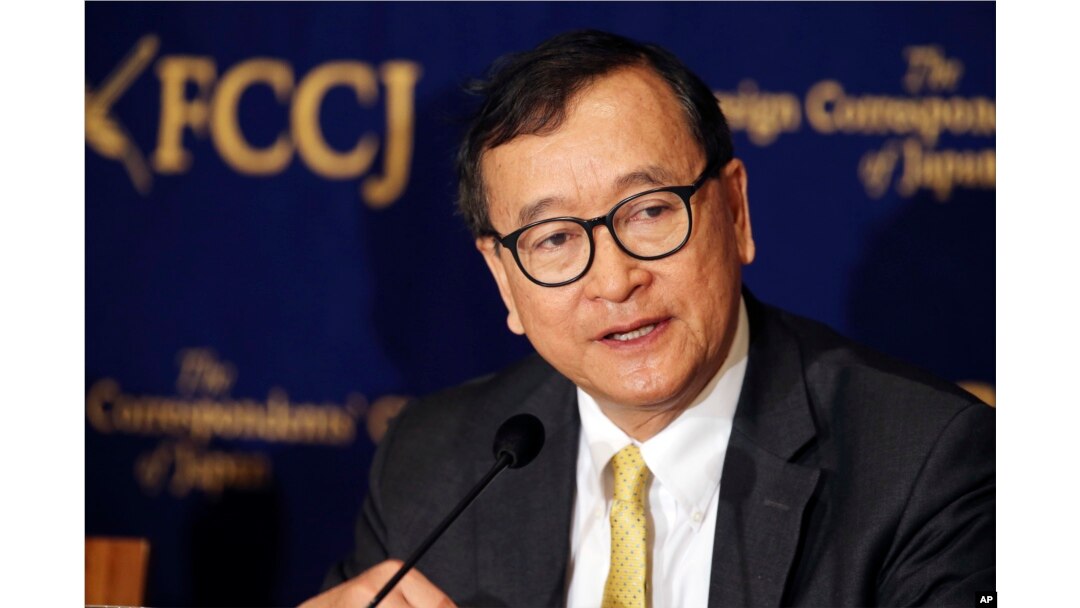 FILE - Cambodia's self-exiled opposition leader Sam Rainsy speaks during a press conference in Tokyo, Japan, In this April 13, 2018.