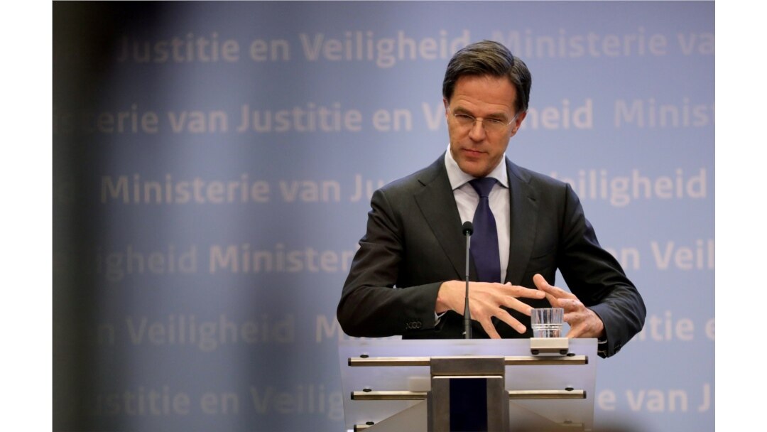 FILE - Dutch Prime Minister Mark Rutte speaks during his news conference in the Hague, Netherlands, March 19, 2020.