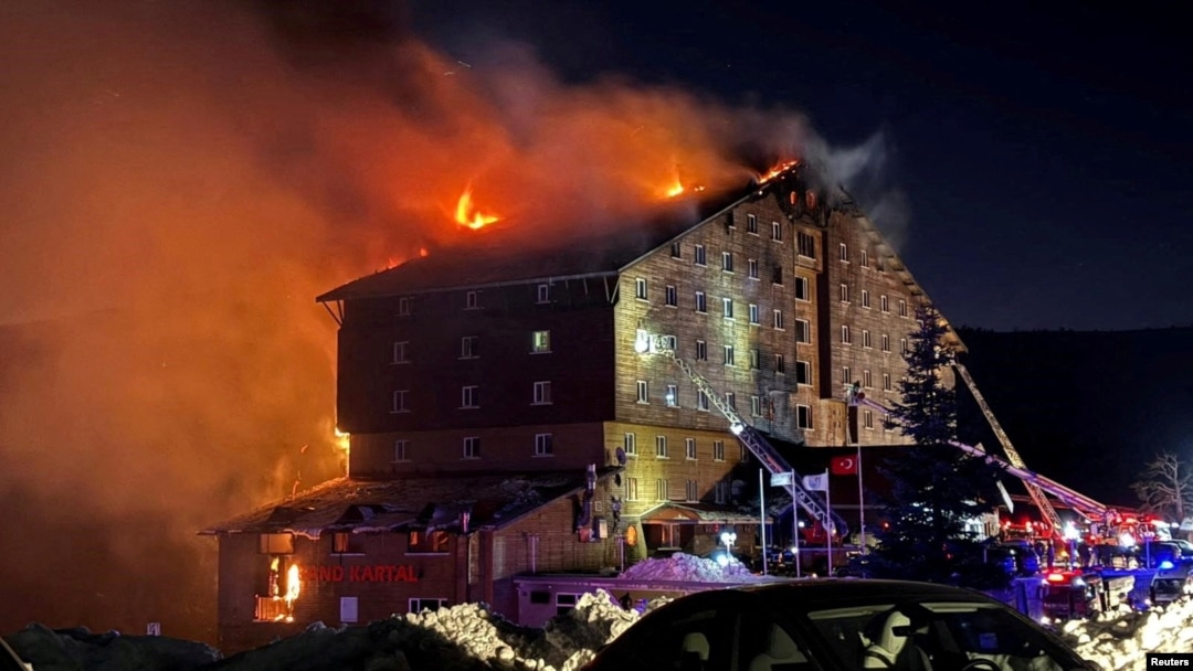 Firefighters work to extinguish a fire at a hotel in the ski resort of Kartalkaya in Bolu, Turkey, Jan. 21, 2025. (Ihlas News Agency (IHA) via Reuters) 