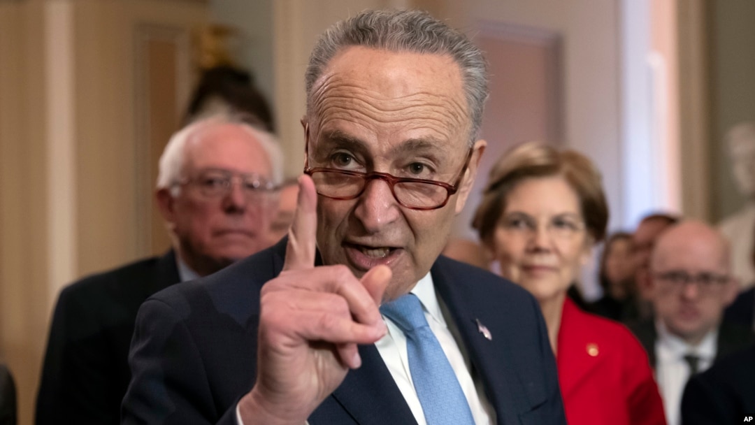 FILE - Senate Minority Leader Chuck Schumer, Democrat-New York, is flanked by colleagues, during a news conference, at the Capitol in Washington, Nov. 14, 2018.