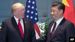 美國總統川普與習近平7月8日G-20會面資料照。