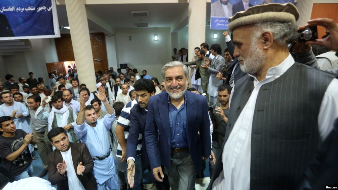 Afghan presidential candidate Abdullah Abdullah arrives for a gathering with his supporters in Kabul, July 8, 2014. 